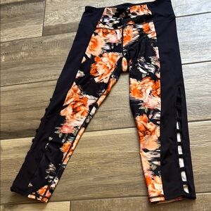 Betsey Johnson Black and Orange Capris with Artistic Design